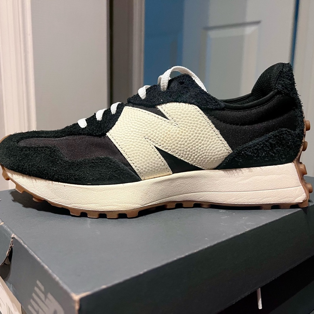 New balance women’s black and white sneakers.